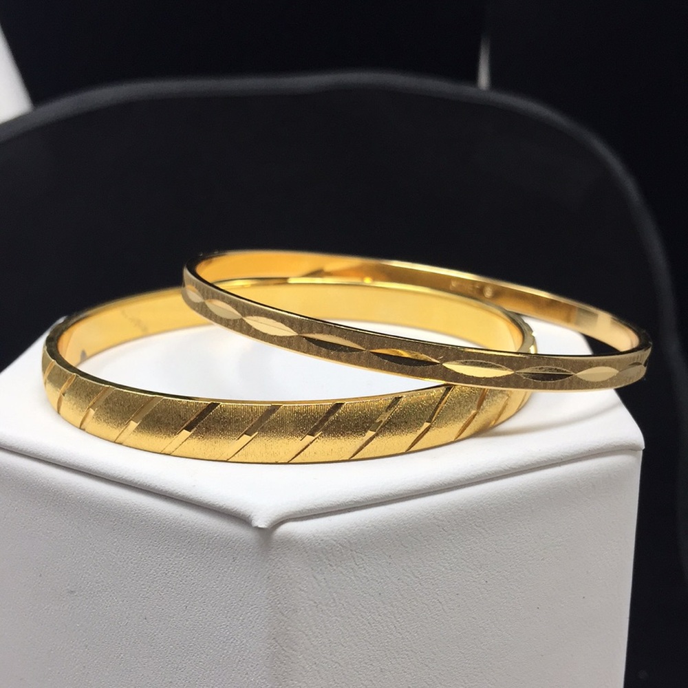 Two Monet Bangles Bracelets Patterned In Gold Tone - image 1